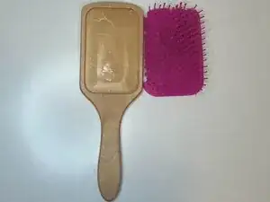 How to Repair a Detached Hairbrush Bristle Pad