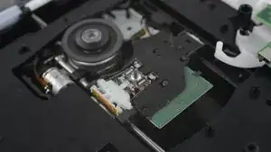 The optical drive's laser pickup assembly is <a href="../../home/external_content?url=https%3A//d3nevzfk7ii3be.cloudfront.net/igi/av5Ye1f1HLirGTsg" rel="nofollow noopener noreferrer" target="_blank">ready for its closeup</a>.