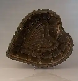 A historical heart-shaped cake pan