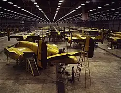 Workers assemble B-25 aircraft in Kansas City.