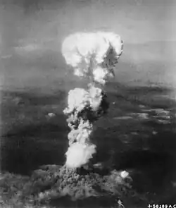 Atomic explosion over Hiroshima, killing over 66,000 people