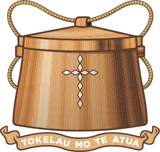 The Badge of Tokelau, featuring a tackle box and the Tokelauan text "Tokelau Mo Te Atua".