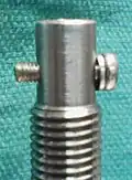 1. The end of the micrometer screw from the Cambridge Instruments Biocut 2030 microtome. An M3x12 screw in the cross hole to engage a 0.5" socket on a torque wrench.