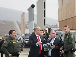President Trump in San Diego examining border wall prototypes in 2018.