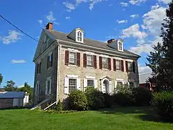 Georgian architecture house. The two chimneys can be seen on the right and left side of the roof.