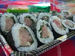 Maki rolls containing hamachi and green shiso