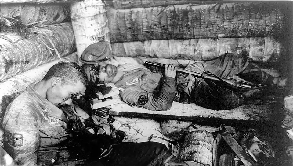 Two Japanese Imperial Marines who committed suicide by shooting themselves rather than surrender to U.S. Marines, Tarawa, Gilbert Islands in the Pacific., 1945