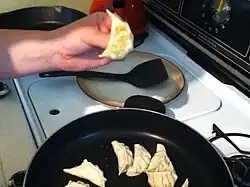Step 9: Fry the pot stickers a few minutes until the bottoms look slightly browned, like this.