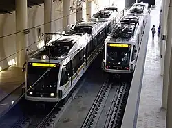Two Gold Line trains at Memorial Park Station, one of 3 below-grade stations.