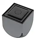 The top of the Ouya contains four hex screws and an indicator LED.[3]