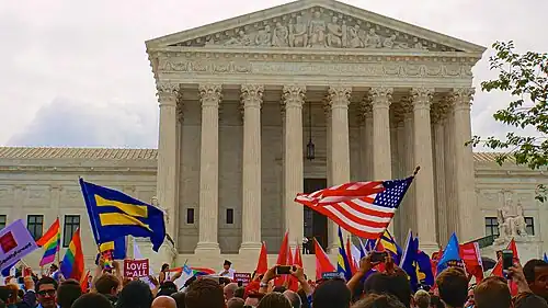 A crowd outside the Supreme Court on 26 June 2015 celebrates the Obergefell v. Hodges decision.