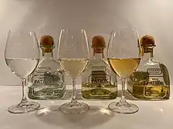 Three different varieties of tequila by age (left to right: blanco, reposado, añejo)