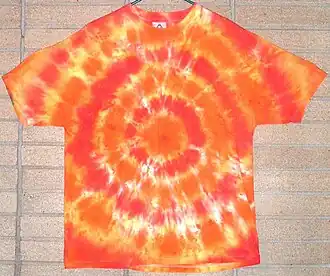 A tye dye shirt, a popular clothing option for Hippies.