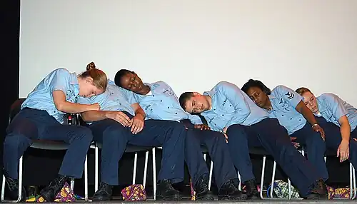US Navy 070816-N-1082Z-003 During a DUI safety, Sailors are hypnotized and put in various comical situations at the Naval Air Station Oceana theater.