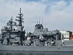 JS Ōyodo and JS Uraga at Yokosuka on 22 September 2013.