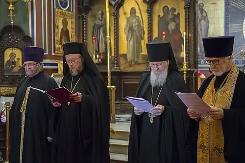 Clergy in front of the Iconostasis