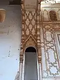 Intrado of the arch (above) next to the mihrab, as well as the opening leading to the imam's entrance (below)