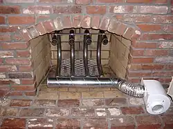 Another example of a large and powerful grate heater system that incorporate a large, thermally-conductive heating design and a single-blower, high-CFM, forced-air delivery system