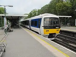 A suburban diesel toward Marylebone along the western platform.