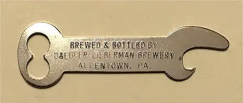 Bottle opener with advertising text - sometimes given away by shops and beverage companies as promotions