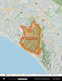 A map of the roughly rectangular fire perimeter (with several protrusions) in orange, showing surrounding communities and highways.