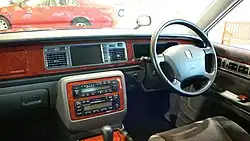 1997 Century driver's seat. Note that the steering wheel design was later adopted for various Toyota models throughout the 2000s.