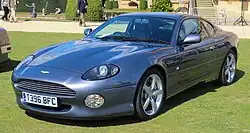 Front three-quarters view of a silver DB7.