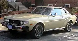 1976 Toyota Celica coupé GT (RA24, US). Note the enlarged bumpers, required by US federal law.
