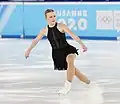 Nella Pelkonen bends her knees in preparation to jump