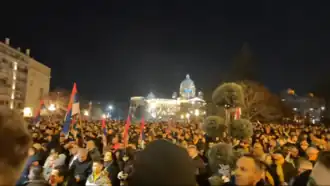 Demonstrators outside the building of the City Assembly of Belgrade