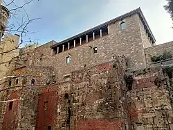 Remains of the Roman wall in Carrer de la Tapineria.