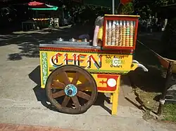 Traditional colorful wooden sorbetes pushcart in Rizal Park, Manila
