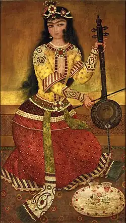 A woman playing the kamancheh. Detail from a wall painting in which Mohammad Ali Shah Qajar is surrounded by musicians and dancers. Painted by Abuʾl-Qasim, dated 1816.[12]