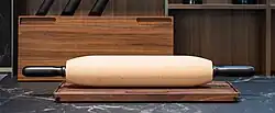 Hybrid rolling pin by Rolling Wonder, combining features of rod and roller pins for optimal performance.