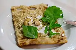 Sangak, cheese, vegetables, walnuts: a common Iranian breakfast.