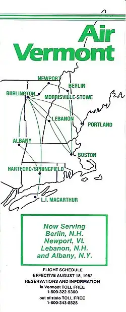 The cover of the timetable has a map of the New England states of America with destinations served by the airlines.