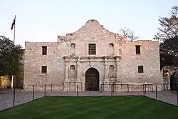 A color photograph of the front entrance of the Alamo Mission