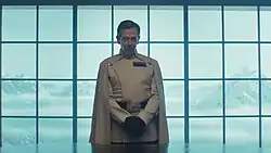 Orson Krennic presides over a meeting