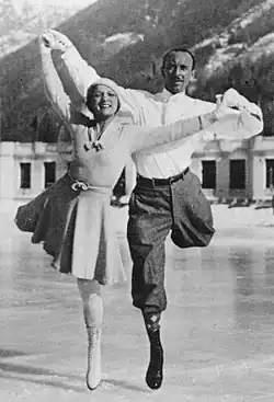Andrée and Pierre Brunet skating on a pond