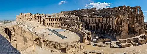 Image 1 Amphitheatre of El Jem Photograph: Poco a poco Panoramic view of the Amphitheatre of El Jem, an archeological site in the city of El Djem, Tunisia. The amphitheatre, one of the best-preserved Roman ruins and a UNESCO World Heritage Site since 1979, was built around 238 AD, when modern Tunisia belonged to the Roman province of Africa. It is the third-biggest amphitheatre in the world, with axes of 148 m (486 ft) and 122 m (400 ft) and a seating capacity of 35,000, unique in Africa. More selected pictures