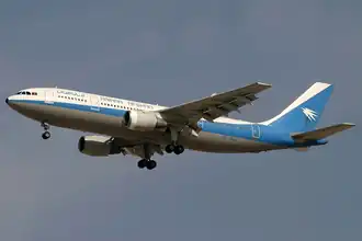 An Ariana Afghan Airlines Airbus A300B4-200 on approach to Dubai International Airport.