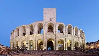 Exterior arcades, with a tower added in the 6th century
