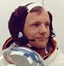 Neil Armstrong wearing a Snoopy cap