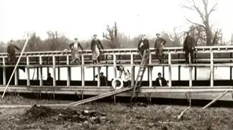 Workmen building Astoria's superstructure 1911