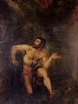 Half naked kneeling man in chains