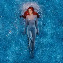 Ava Max with red hair lying amongst blue diamonds