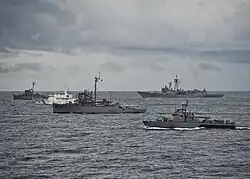 BRP Salvador Abcede (PG-114), BRP Miguel Malvar (PS-19), BRP Iloilo (PS-32), BRP Pampanga (SARV-003), and USS Vandegrift (FFG-48) for a photo exercise (PHOTOEX) during CARAT 2012-Philippines
