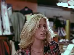 A screencap of Bambi Woods from Debbie Does Dallas