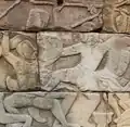 Thrust kick to the quadriceps. Located at Banteay Chhma temple(12th/13th century)