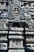 A pediment in one of the sides of the temple depicting Shiva in a sitting position